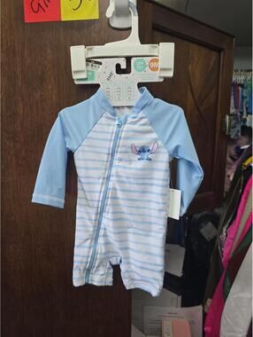 9m brand new disney stitch swimsuit, rash guard.Item 342